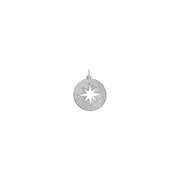 Celestial starburst charm in silver with open center and glittering accents