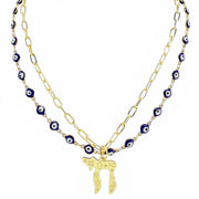 Love Lisa Eden chai evil eye layered necklace blue gold with enamel evil eye chain and paperclip chain detail
