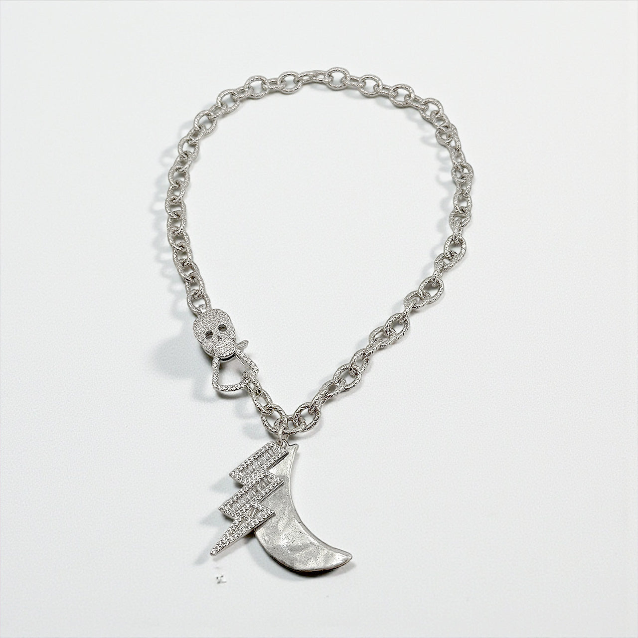 Love Lisa skull clasp detail on electric moon statement necklace silver