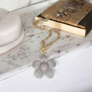 Elegant Large Flower Charm styled with books and decorative setup