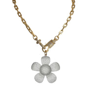 Large flower charm styled on necklace 