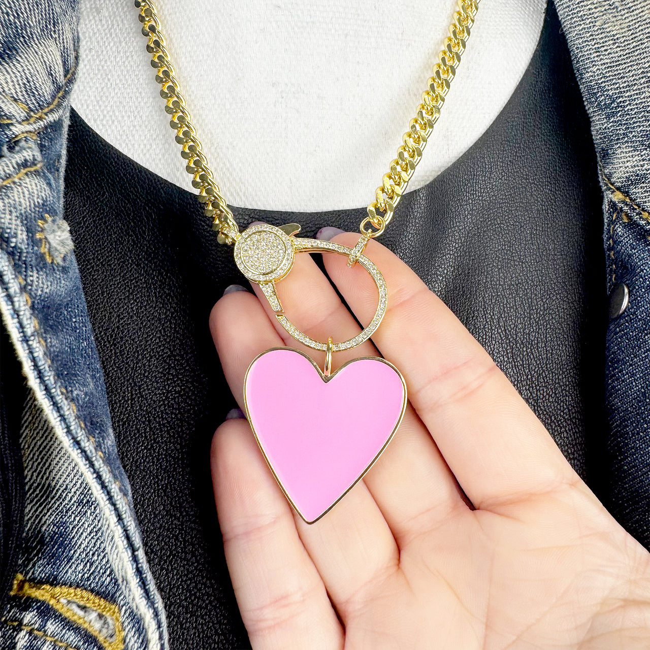 Bold pink and gold enamel heart charm necklace detail