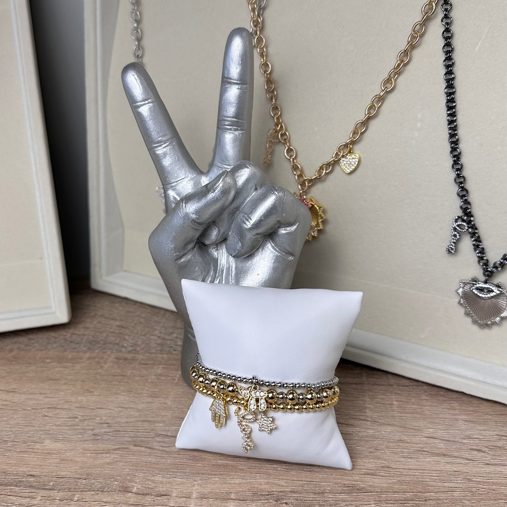 Love Lisa Eternal Blessing bracelet stack Gold Silver display

