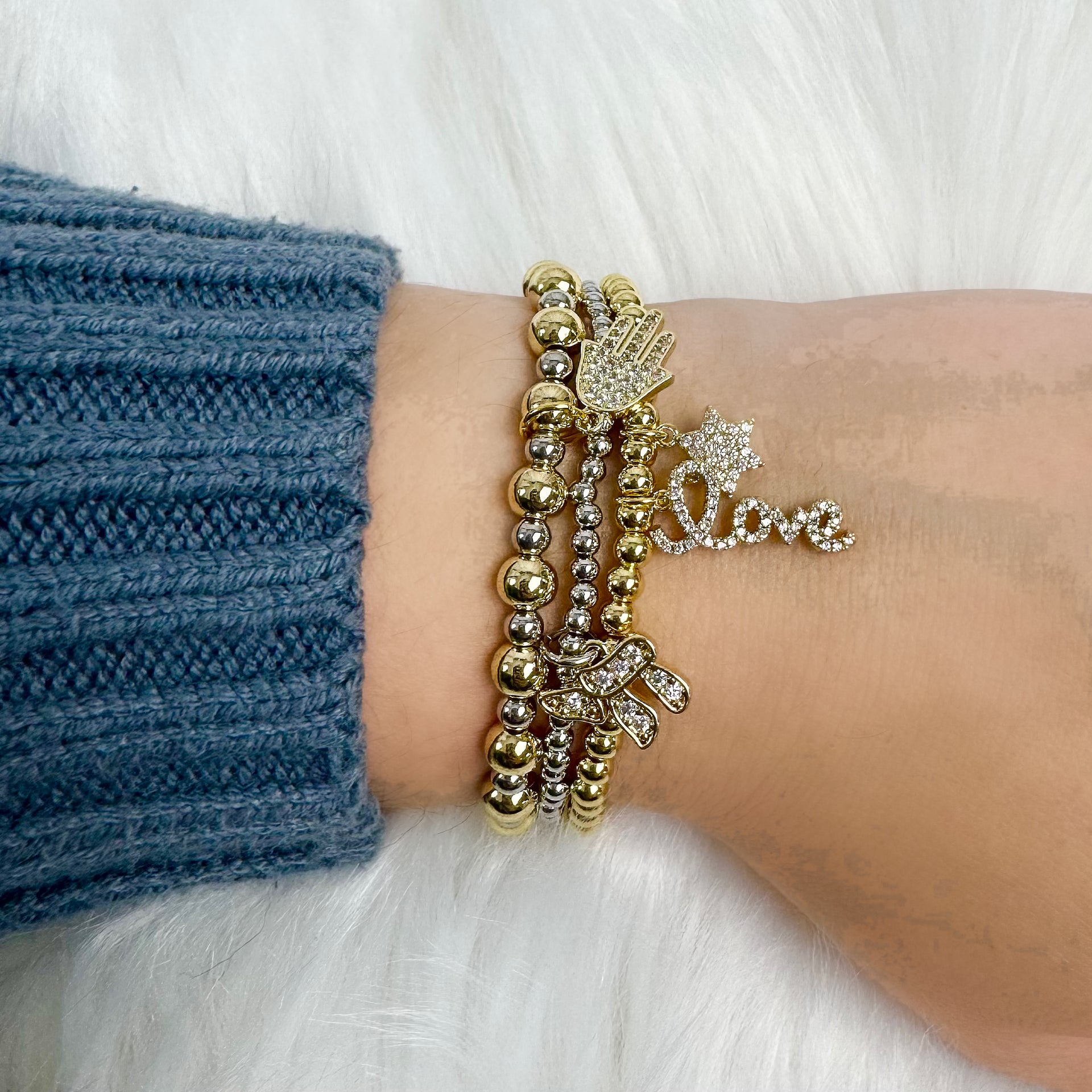 Love Lisa Eternal Blessing bracelet stack Gold Silver on model

