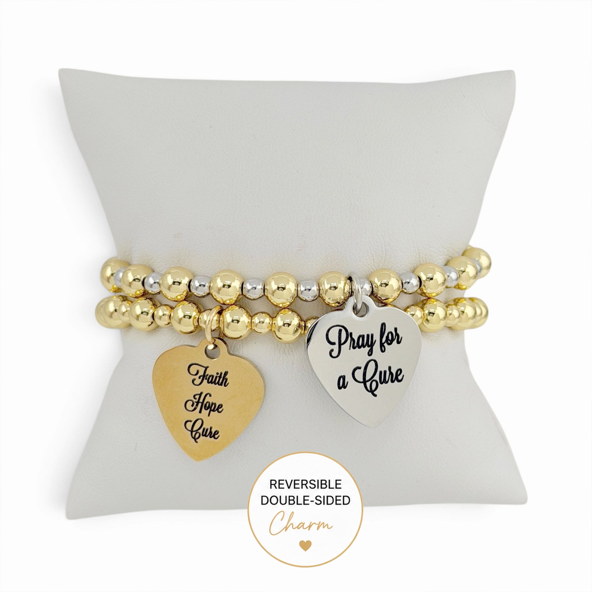 Love Lisa Faith Hope Cure reversible bracelet displayed on pillow showing Pray for a Cure heart charm message
