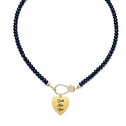 Love Lisa Faith Hope Cure reversible T1D awareness necklace with gold engraved heart charm on Harper Navy beaded clasp necklace