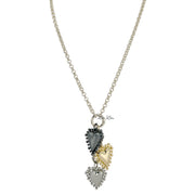 Love Lisa silver long heart charm necklace featuring three textured heart pendants and wrap design