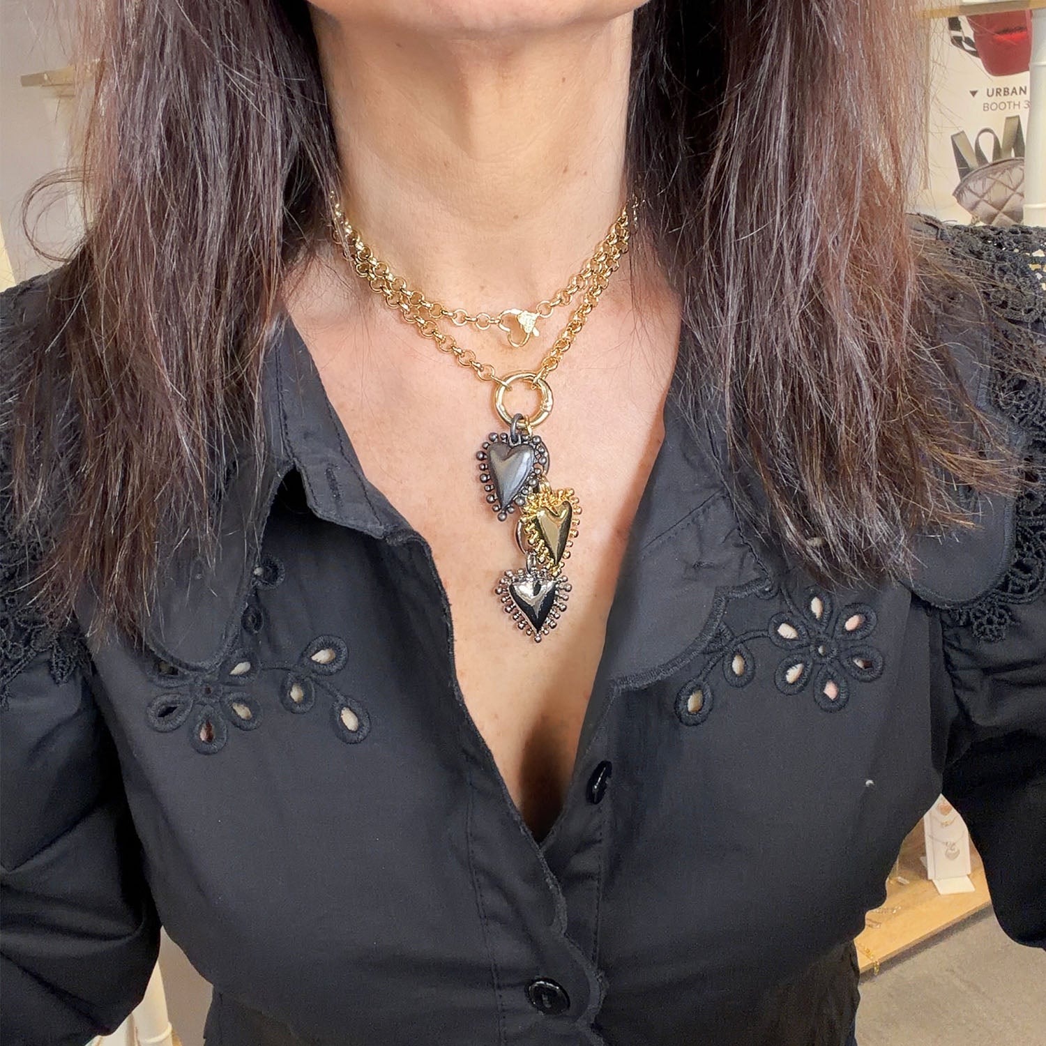 Love Lisa long heart charm necklace styled as double wrap layered heart jewelry look