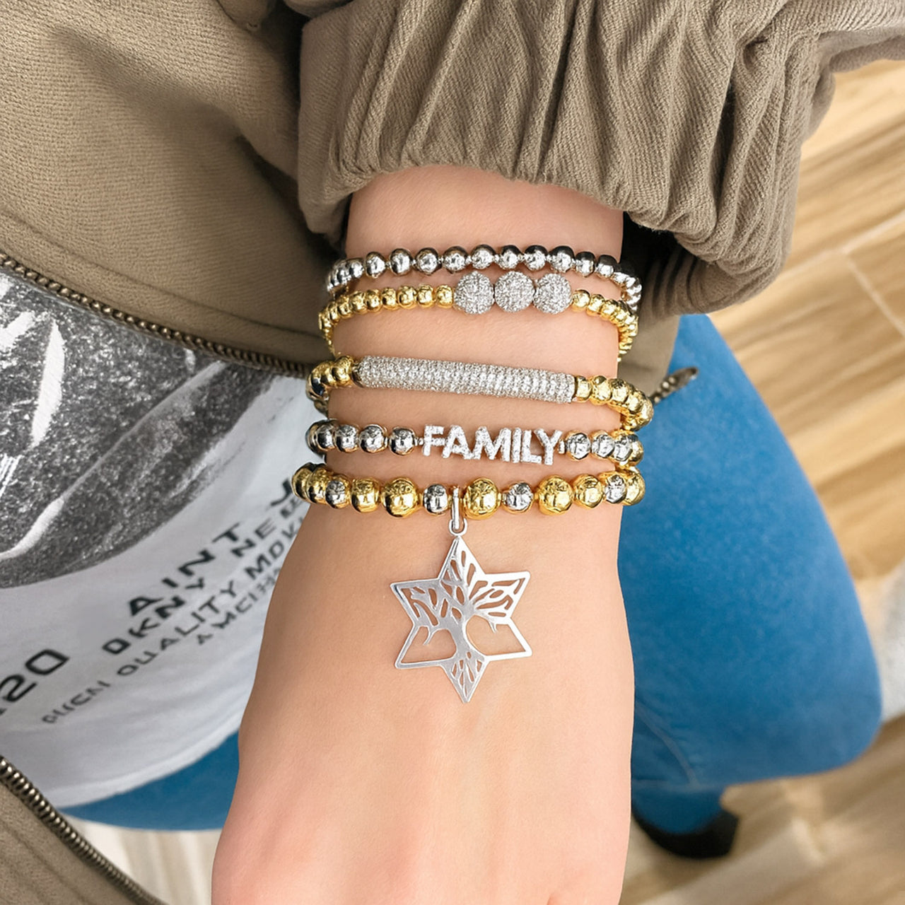 family star of david bracelet stack five bracelets worn on model with family charm love lisa