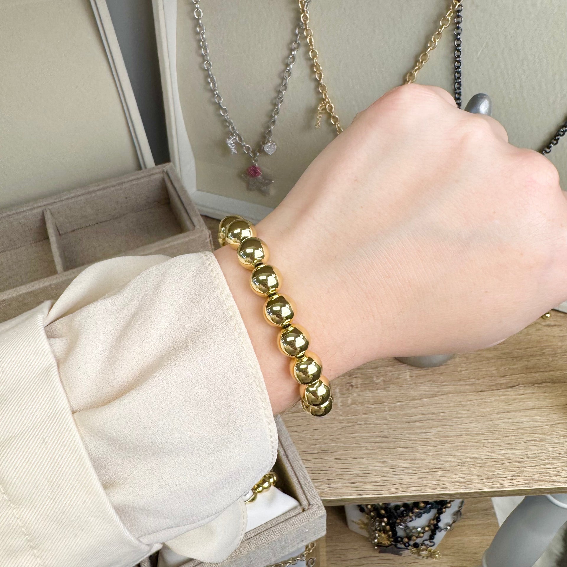 famous 10mm beaded stretch bracelet worn on wrist love lisa