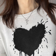 love lisa famous ribbon bow necklace styled on model with t shirt