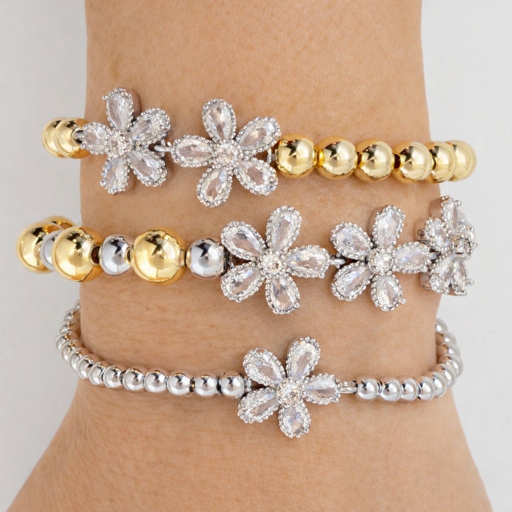 pave crystal flower bracelet detail beaded bracelet stack floral accents close view