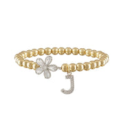 love lisa gold felicity flower initial charm bracelet with crystal flower charm and pave letter charm on gold beads