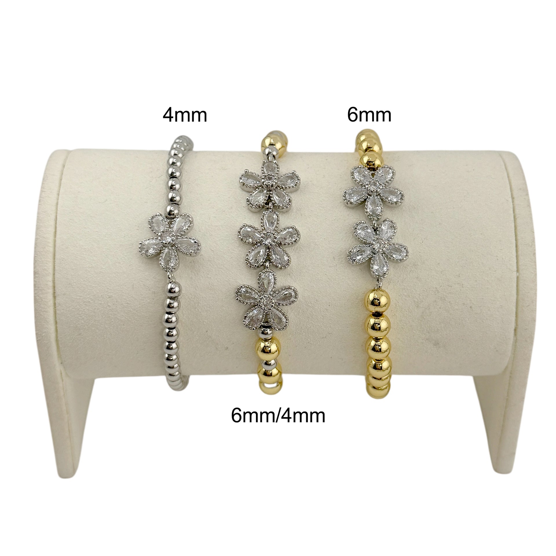 pave crystal flower bracelet detail beaded bracelet stack floral accents close view
