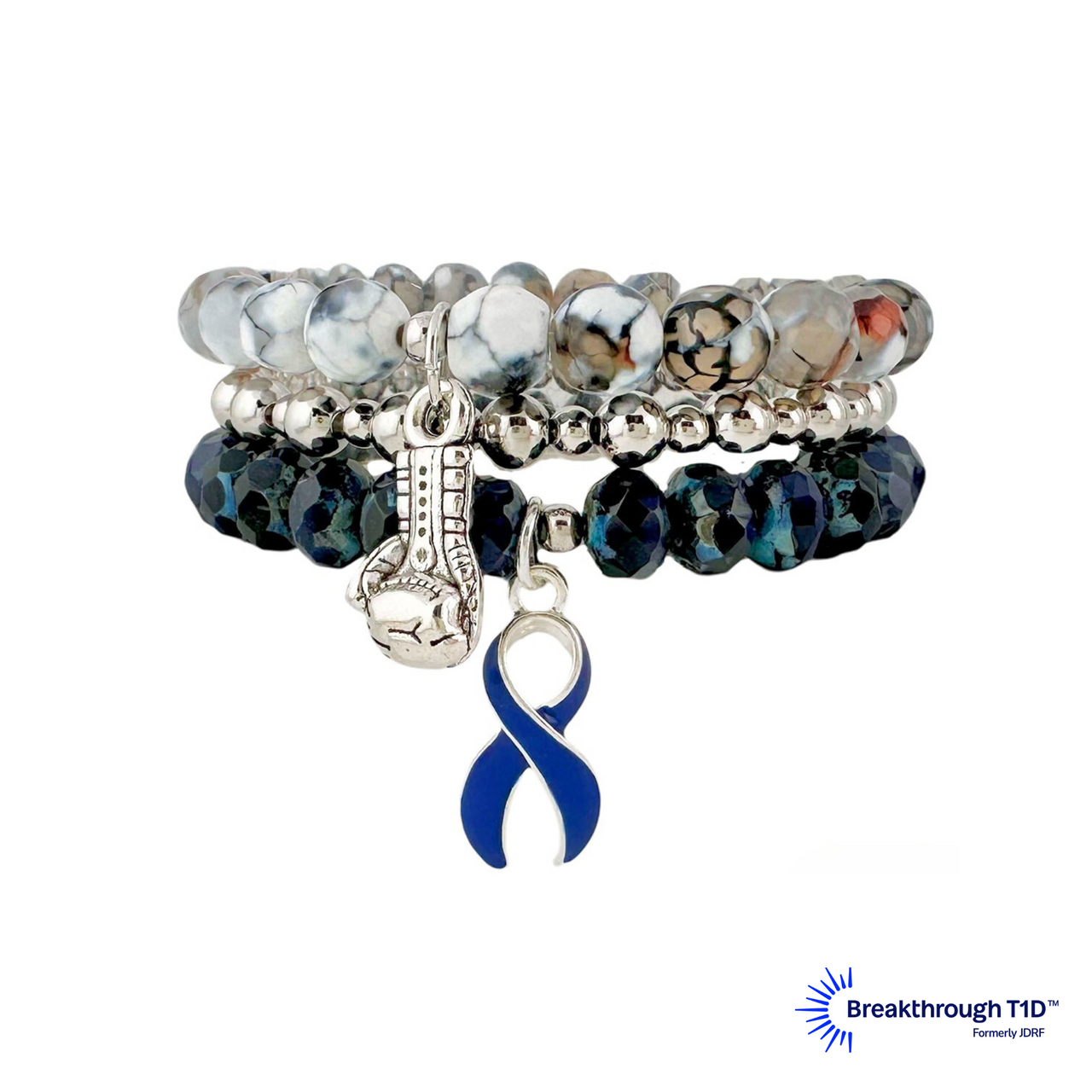 A stack of three awareness bracelets featuring a blue and silver bead design with a white ribbon symbol, and a silver chain with a blue bead.