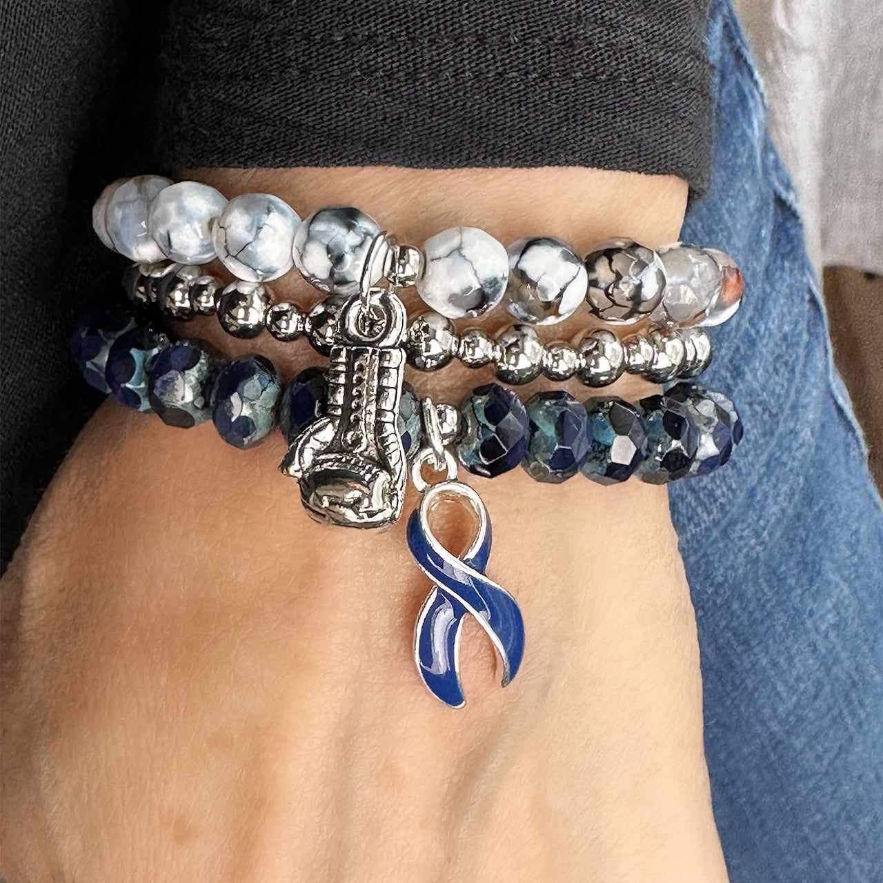 Fight Like a Girl T1 Diabetes Awareness Bracelets by Love Lisa worn on model in stacked set for Breakthrough T1D support