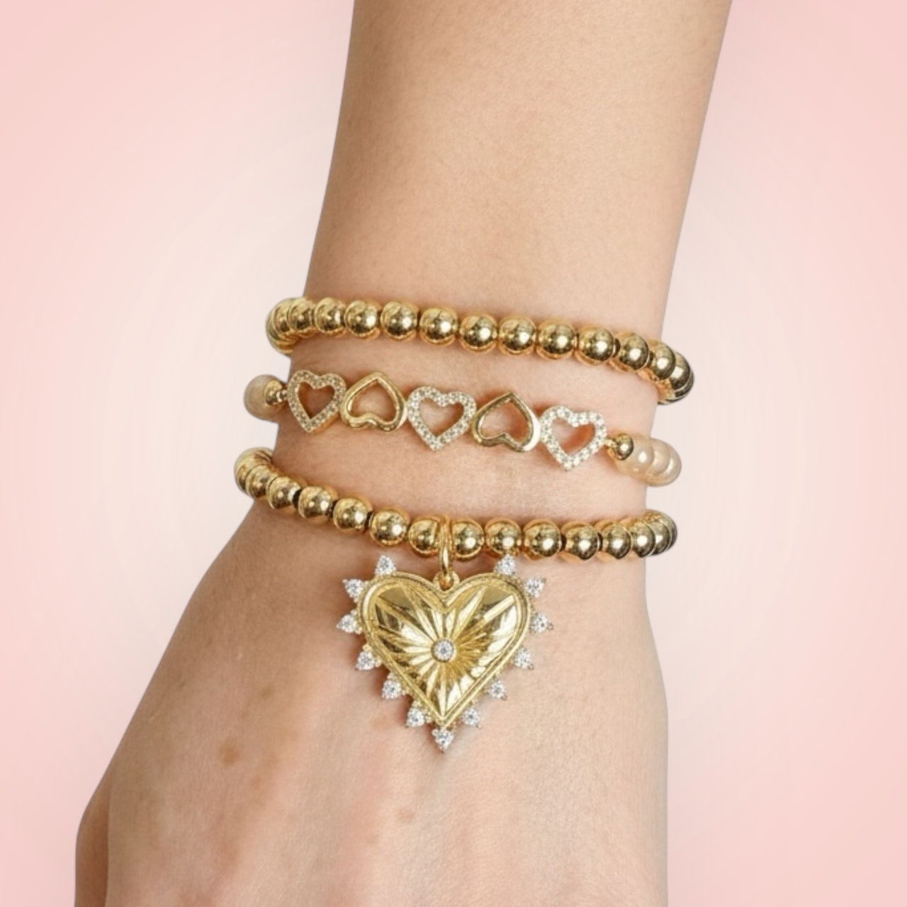 love lisa five hearts crystal stretch bracelet stacked on wrist