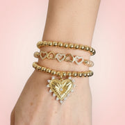 love lisa five hearts crystal stretch bracelet stacked on wrist