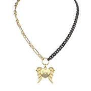 Two necklaces with angel wing pendants on a white background