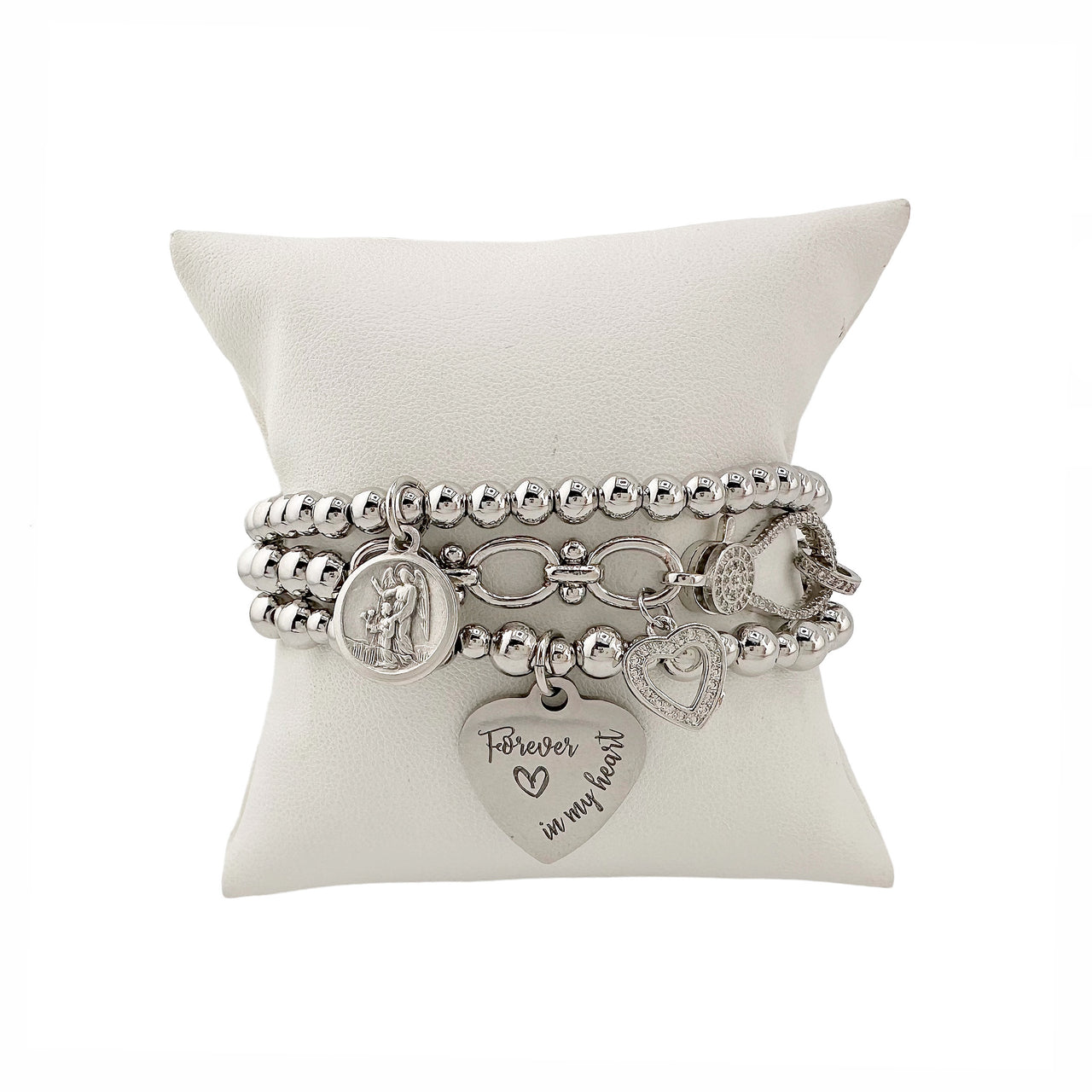 love lisa forever in my heart bracelet stack with silver beads saint charm pave heart and engraved heart charm