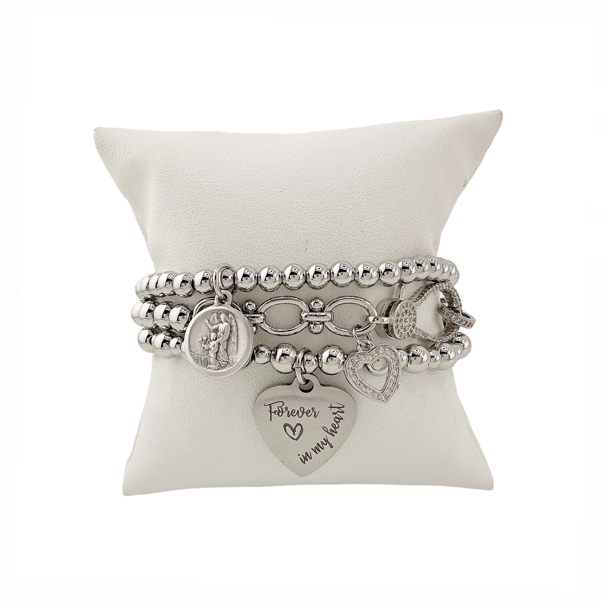love lisa forever in my heart bracelet stack with silver beads saint charm pave heart and engraved heart charm