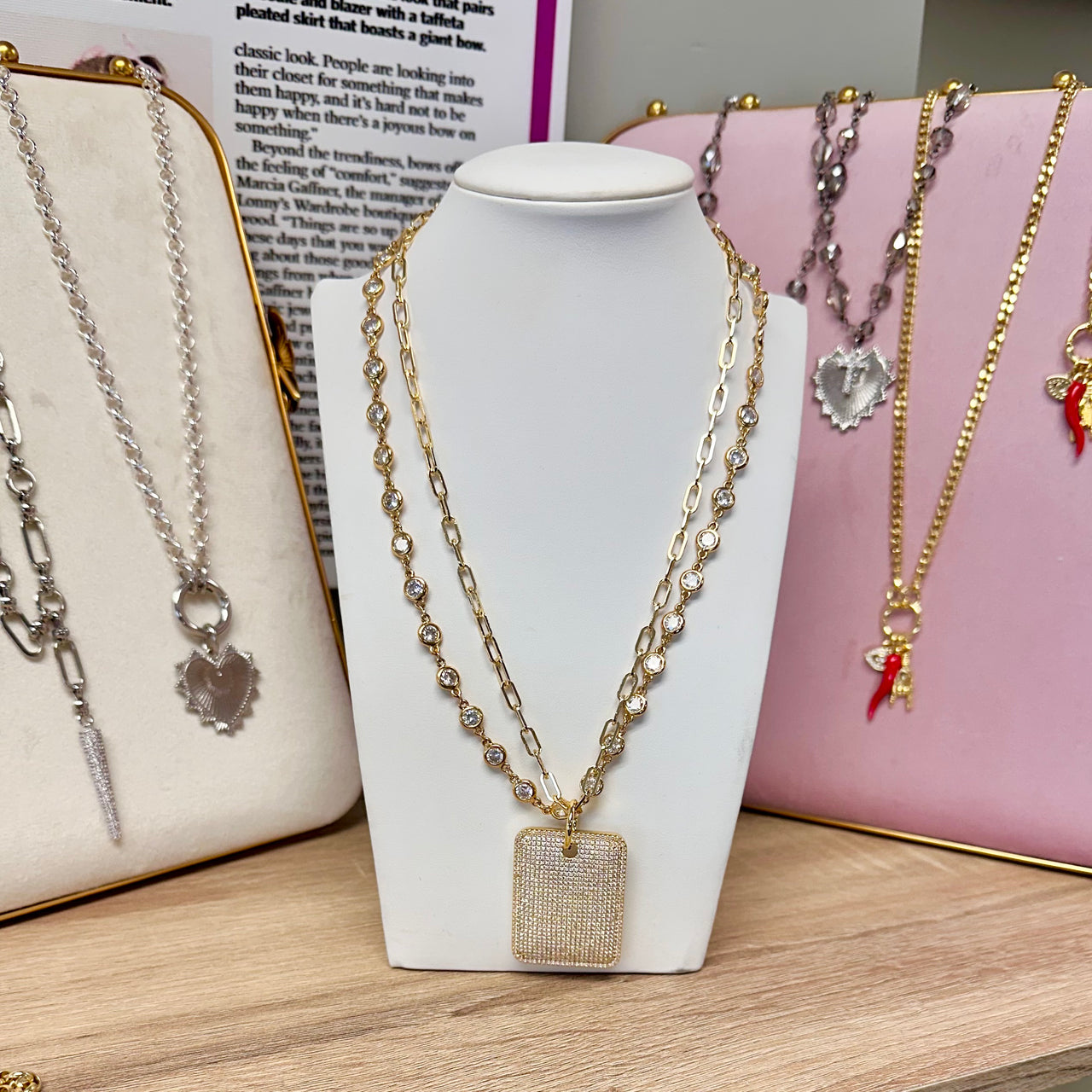 Love Lisa Gabby Diamond Dog Tag Necklace in gold on a display