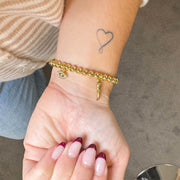 Gabriella Italian Horn Charm Bracelet gold beads with evil eye mano and cornicello charms on wrist Love Lisa