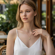 Detailed view of the gold chain on Gia Large Pavé Horn Necklace with Italian Cornicello pendant