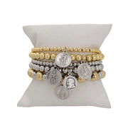 Love Lisa Gia Religious Prayer Bracelet Stack display with saint charms