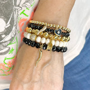 Love Lisa lifestyle photo Gianna Italian Horn Stack of Beaded Bracelets
