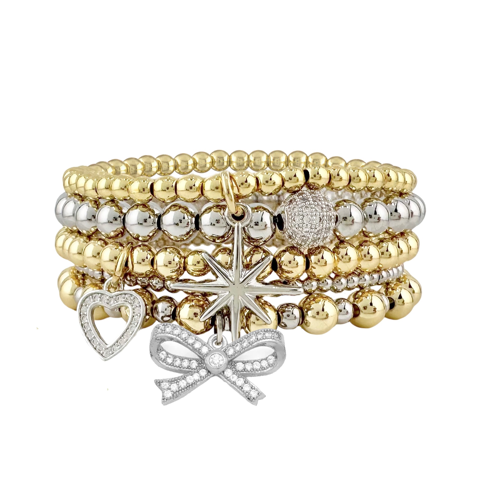 A stack of gold-colored bracelets featuring charms such as a star, heart, ribbon bow, and beads, on a white background.