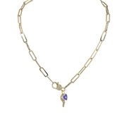 blue and gold Italian horn necklace with heart and evil eye charms