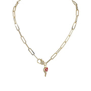red and gold Italian horn necklace with heart and evil eye charms