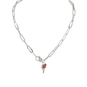 red and silver horn charm necklace with heart and evil eye