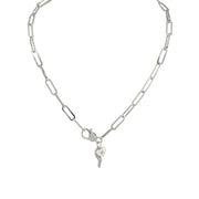white and silver horn charm necklace with heart and evil eye