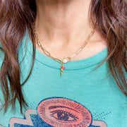 model wearing gold italian horn cornicello necklace with red evil eye charm love lisa italian jewelry gift for her
