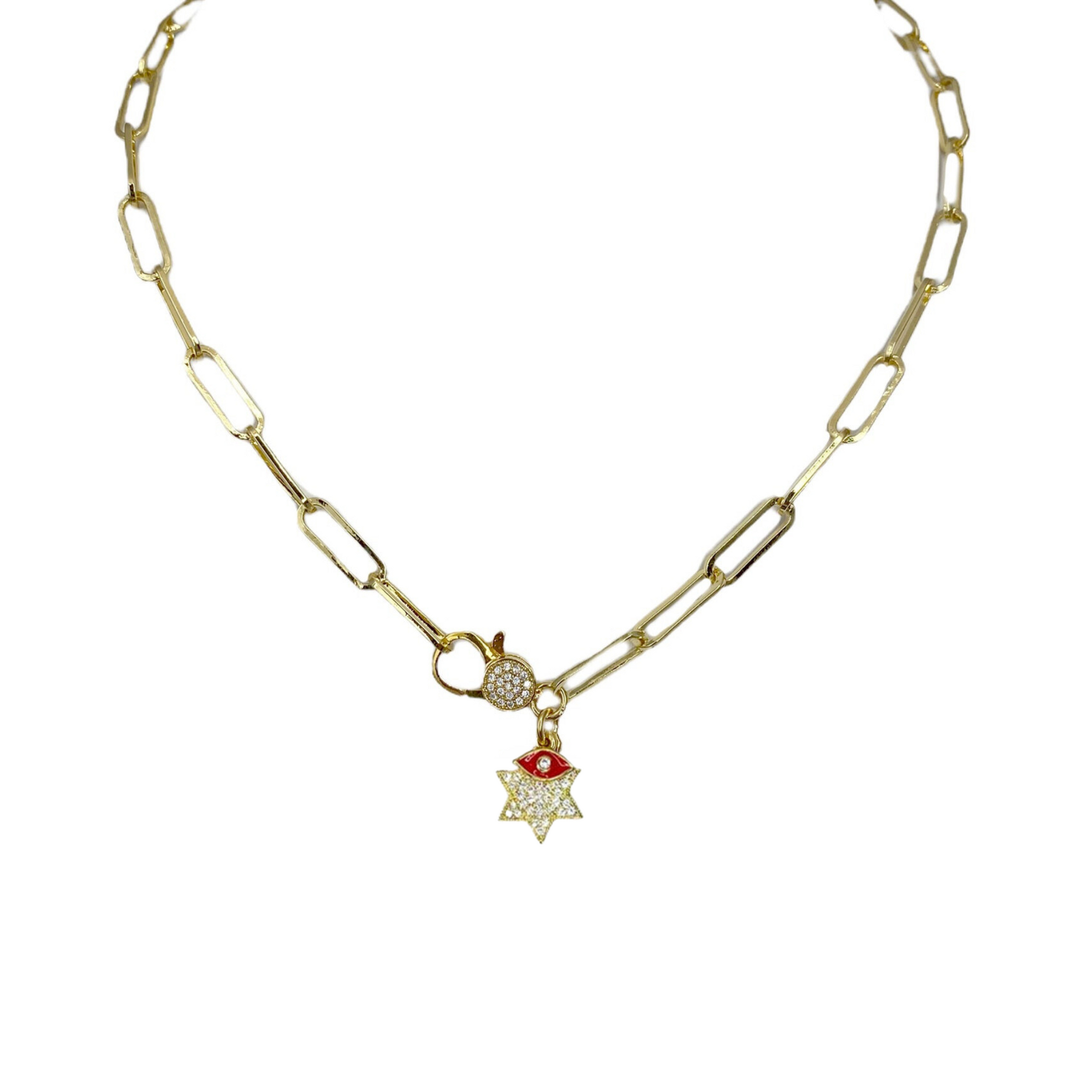 A gold-colored paperclip necklace with a star of david charm and a small red evil eye charm on top of it.