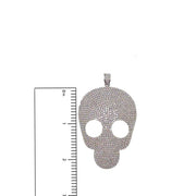 Modern silver-tone skull pendant with sparkle detail measure