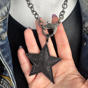 model holding glamorous pave star charm love lisa jewelry star pendant with pavé crystals