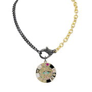 Circular charm featuring evil eye and vibrant mystical icons