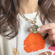 Gold enamel evil eye charm with multicolor symbols and crystals