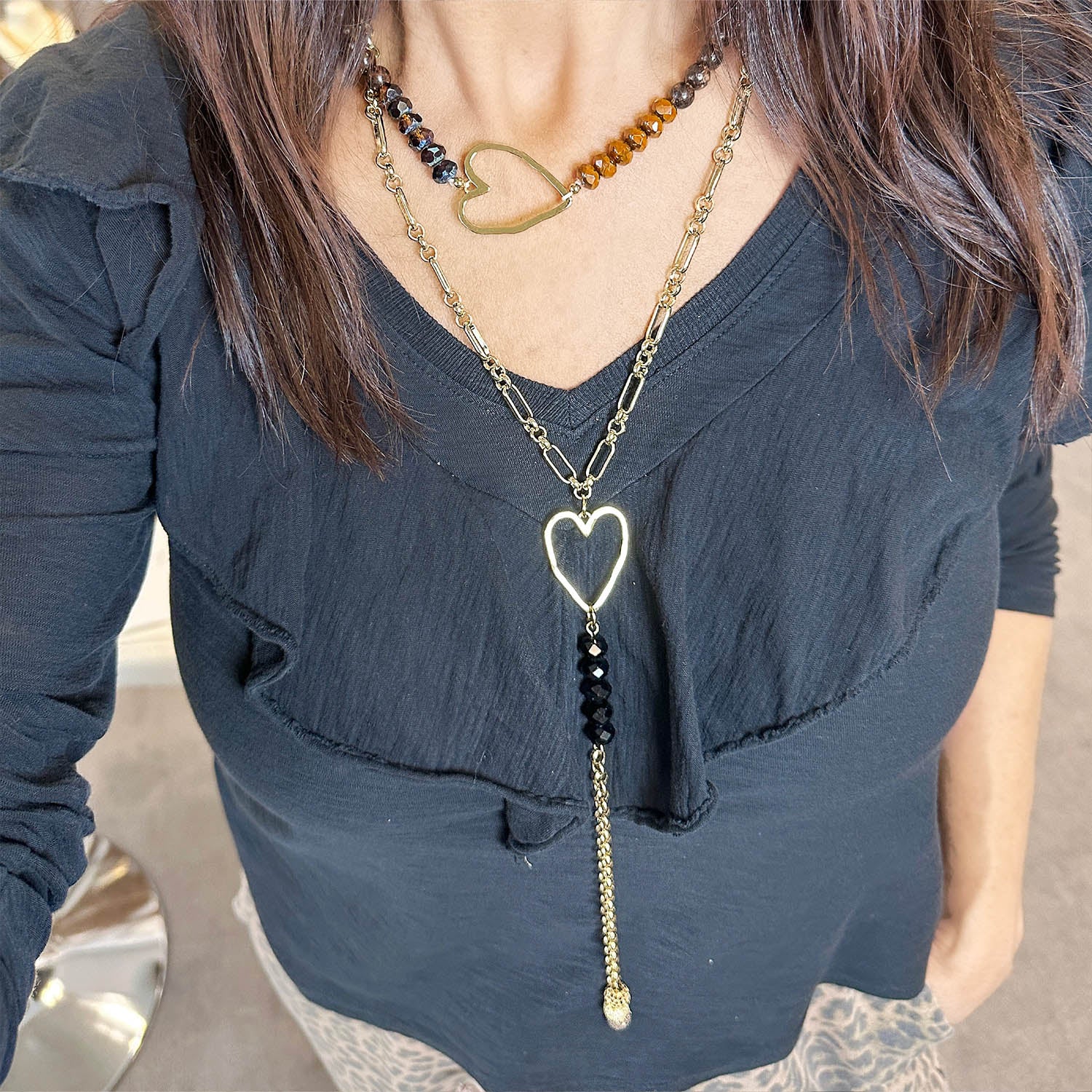 Person wearing the hailey beaded heart choker