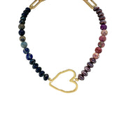 A beaded choker necklace with a heart-shaped gold pendant, featuring a variety of colorful crystal beads.