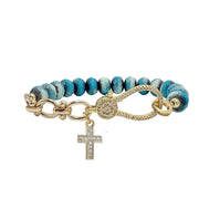 turquoise crystal bracelet with gold cross charm sparkling beaded jewelry