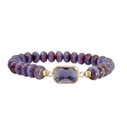 purple crystal beaded stretch bracelet with gold framed center stone