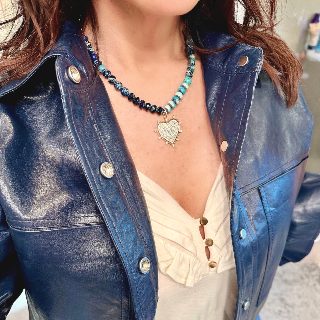 Love Lisa Hailey Heart Pavé Necklace navy blue beads styled with navy leather jacket