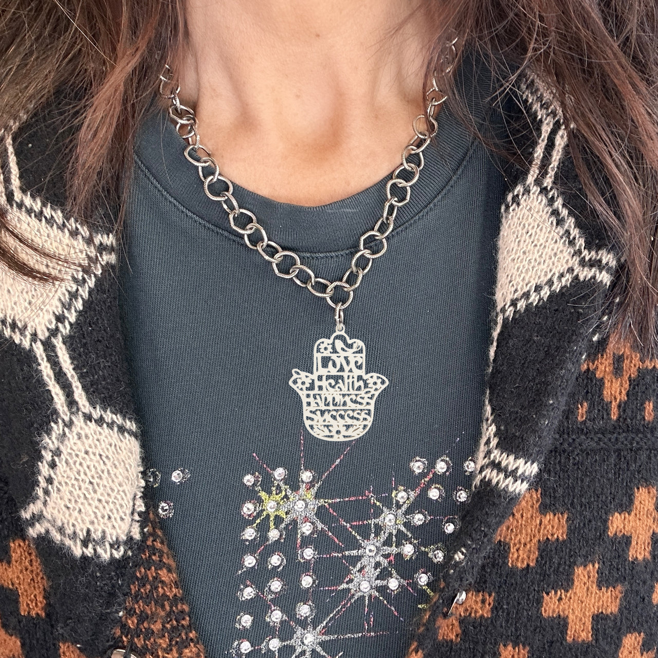 woman wearing gold hamsa necklace love health happiness success pendant by Love Lisa