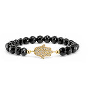 Love Lisa Hamsa Mixed Gemstone Beaded Bracelet in Black with glossy and faceted black beads, polished gold-tone accents, and a sparkling gold-tone pavé CZ Hamsa centerpiece