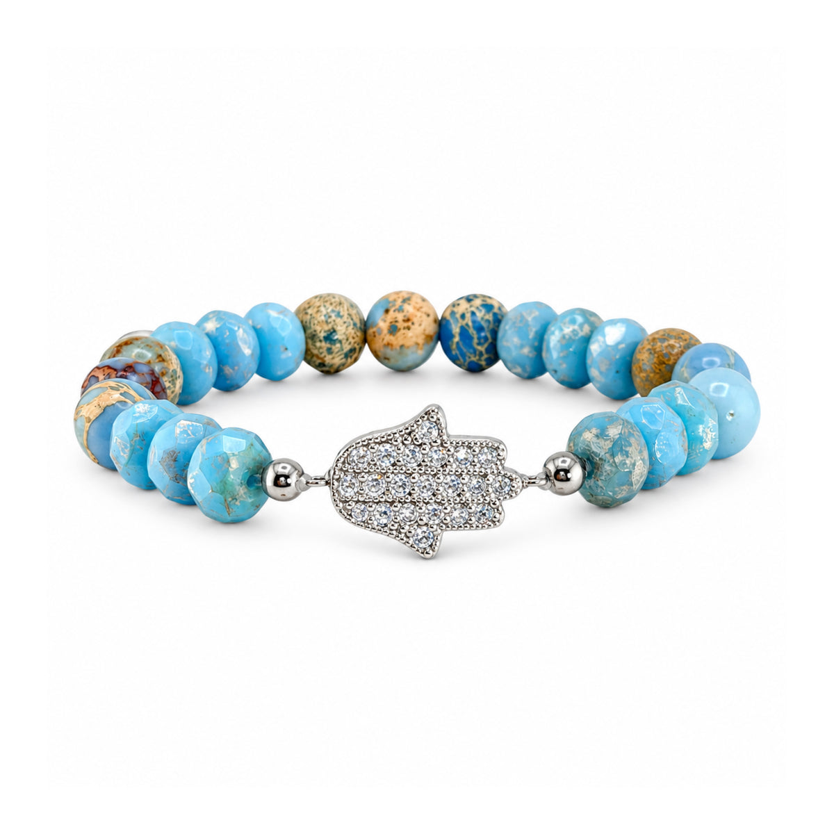ove Lisa Hamsa Mixed Gemstone Beaded Bracelet in Light Blue with faceted blue rondelles, blue and tan patterned round gemstone beads, silver-tone accents, and a sparkling pavé CZ Hamsa centerpiece