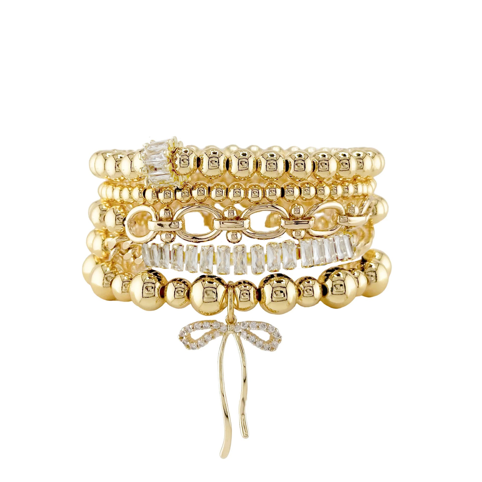 Hannah Bonnet Bracelet Stack in gold with clear baguette crystals and bow charm on elastic stretch bracelets
